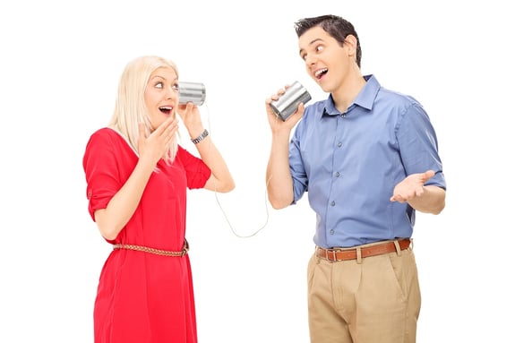 bigstock-Man-and-woman-talking-through--63426832