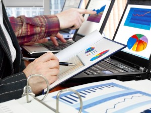 bigstock-Analyzing-data-31328702